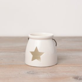  A ceramic T-light holder set in a sleek white tone, complete with a wide star cut decal 