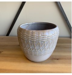  A charmingly simple ceramic based pot set with a woven inspired embossment and a neutral colour tone 