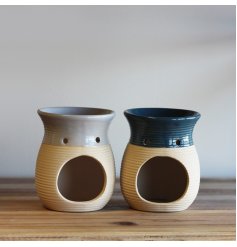 An assortment of cream and blue toned ribbed oil burners, perfect for bringing a coastal feel to any home space