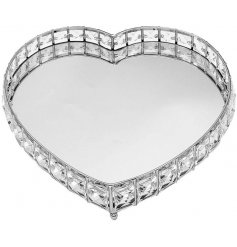   Surrounded with sparkling acrylic crystals, this heart shaped tray also displays a sleek mirrored centre