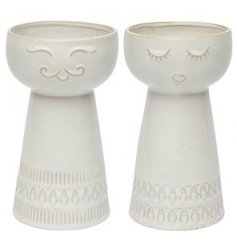 Assorted by their facial accents, these tall decorative vases are a must have for any Neutral themed home space