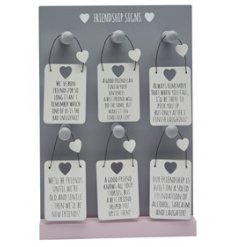 A grey toned display board features a variety of sweetly scripted mini signs 