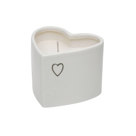 A sweetly scented wax candle in a charmingly simple white ceramic heart pot 