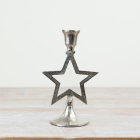 A metal based candelabra with a star decal finished with a rough texture finish 