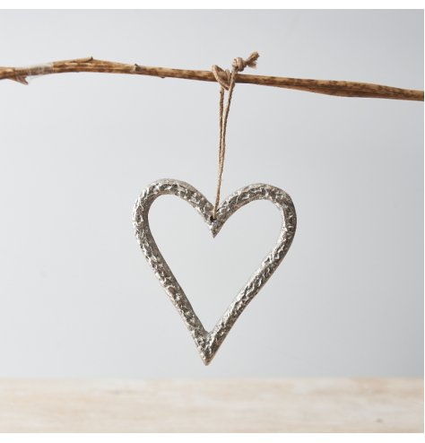 A chic and stylish heart shaped hanging decoration with a characterful textured finish and jute string hanger.