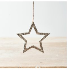 A rustic silver star decoration, complete with a jute string hanger.