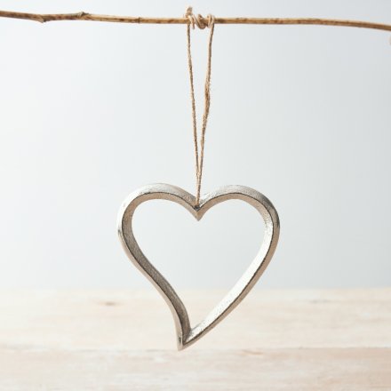 A chic silver hanging heart decoration with a curved tail. Complete with a rustic jute string hanger.