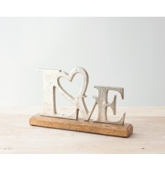 A natural wood block based ornament featuring a rough finished LOVE decal 