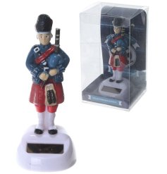 Honor Scotland’s legacy with the Scottish Piper solar-powered decoration.