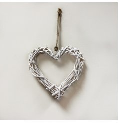 A small sized woven wicker heart shaped wreath set with a stylish soft white tone and jute string for hanging 