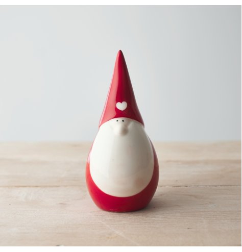 A sweet and simple ceramic gonk with a festive red colour and little heart decal 