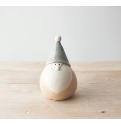  A fun and festive themed plump ceramic gonk with grey and beige tones to complete his look 