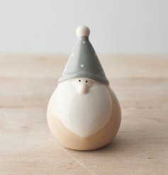   A fun and festive themed plump ceramic gonk with grey and beige tones to complete his look 