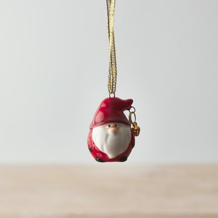 A cute red toned ceramic gonk with an added jingle bell finish 