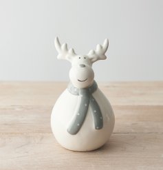  An adorable white toned ceramic reindeer with a plump body and festive grey scarf 