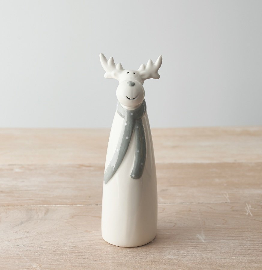  A sweet and simple tall standing ceramic reindeer complete with a grey nose and matching grey dotted scarf 