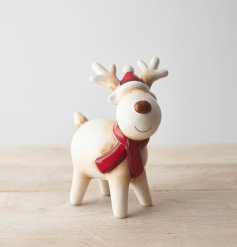  A delightful decoration to bring to the home during Christmas time, a ceramic reindeer with festive tones and a red nos