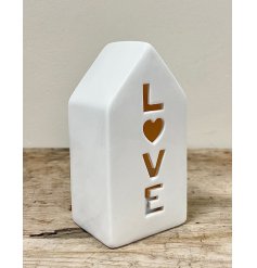 A beautifully charming home t-light holder with a Love cut out decal 