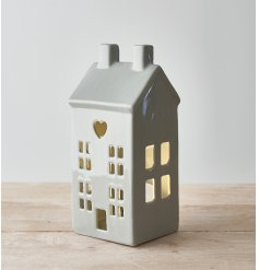A chic and simple grey toned house with only an added heart cut decal and tlight holder option 