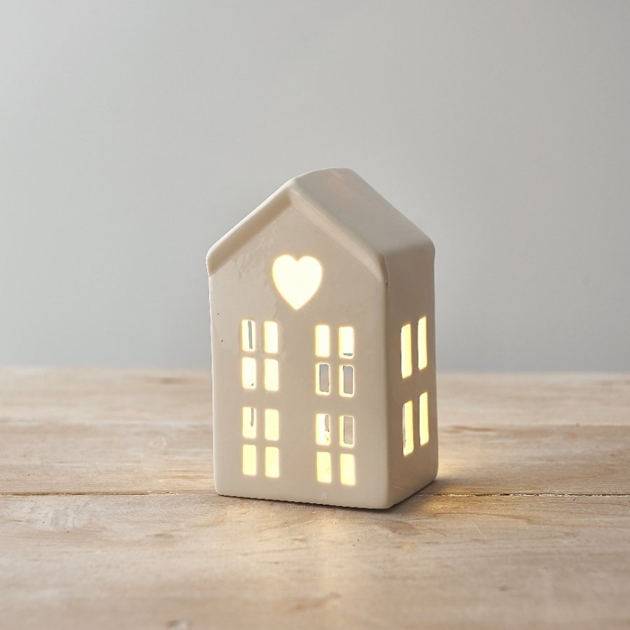 A sweet little ceramic house with LED lights