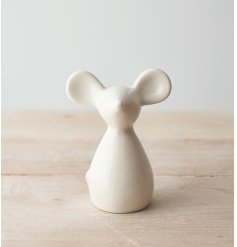   A simple and plain white toned ceramic mouse with large ears and cute nose 