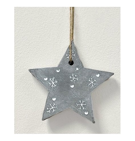 A sleek and simple concrete based star hanger beautifully detailed with an embossed snowflake and dot decal 