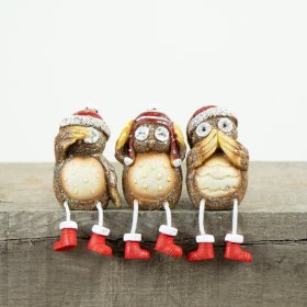  A cute and quirky mix of traditional coloured shelf sitting owl figures with a natural base tone to each 