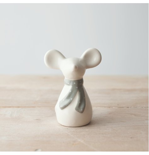 A ceramic based mouse set with simplistic features and a grey spotted scarf to complete his look 