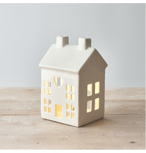 A White Ceramic House W/Heart Decal