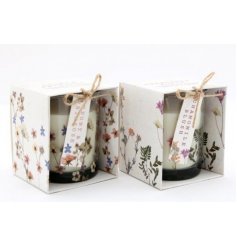 An assortment of floral covered candle pots, each filled with a scented wax centre