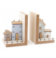 a set of 2 wooden based book ends with a cute wooden house scene to each 