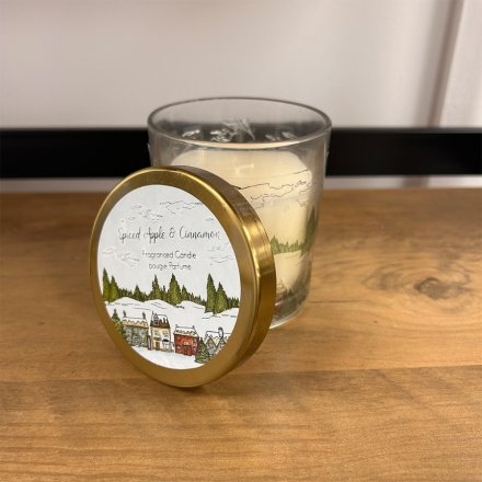  A charming glass candle pot complete with a festive Christmas Village printed decal