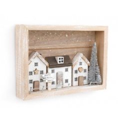  a rustic wooden frame plaque with a wintered village display 