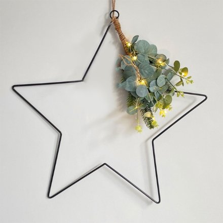  A simple black toned wire star shaped hanging decoration with a jute string and LED foliage to complete the look 