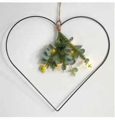 A stunningly simple black wire heart decoration with LED lights, hessian battery bag and entwined eucalyptus leaves 