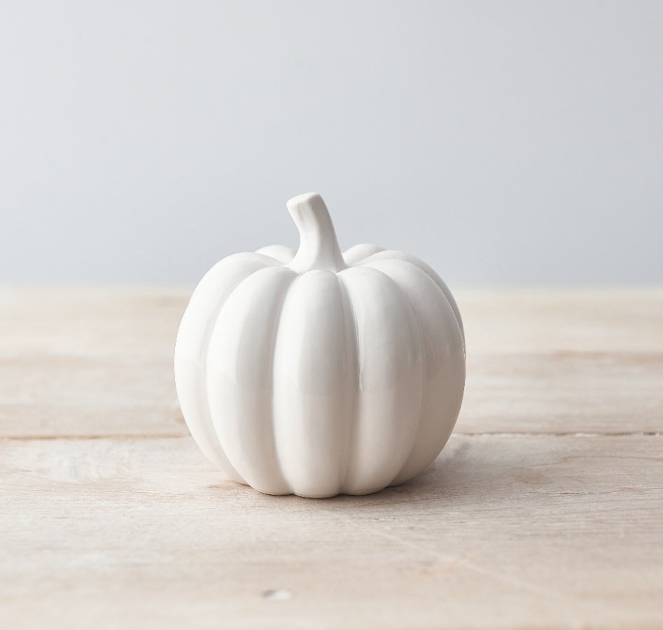 A sleek, simple and stylishly set ceramic pumpkin 