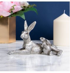 A silver toned Resin based Hare and Baby Ornament, complete with intricate detailing 