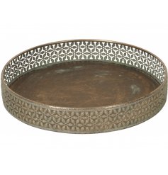A stunning way to display table centre accents, a distressed bronzed round tray with a cut decal edging 