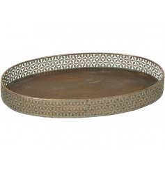 A stunning way to display table centre accents, a distressed bronzed round tray with a cut decal edging 