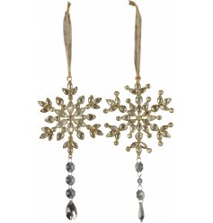 A mix of glitzy themed hanging snowflake decorations, both with added acrylic dangling features