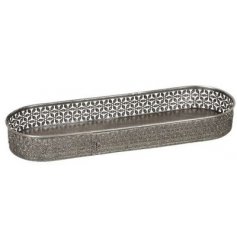  A gorgeously vintage themed iron based display tray with a floral pattern surround 