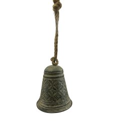 A simple antique silver bell hung from a jute string 