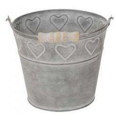 A rustic looking bucket complete with a chunky wooden handle and embossed heart motif surrounding it 
