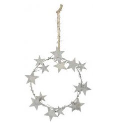  A stylishly simple metal wreath set with star cut decals and a rustic finish to complete it 