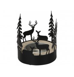 Sure to bring a dazzling shadow display, a small tlight holder with a Woodland Cut Scene surrounding it 