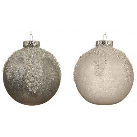 An assortment of shatterproof bauble set with sleek icicle finish to both 
