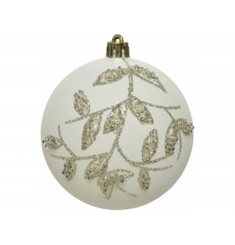 A stunning white toned glass bauble, decorated with a shimmery glitter leaf patterning 