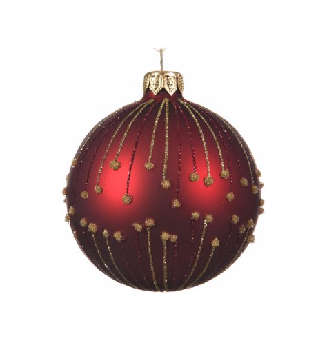A traditional red toned glass bauble set with glittery touches and prints 