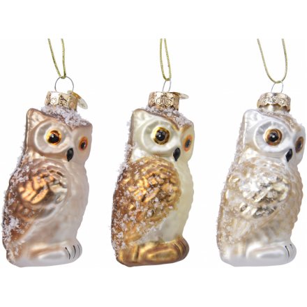 A festive mix of glass owl shaped baubles, featuring added gold tones and glittery hints 