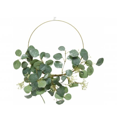 A beautiful half wreath decorated with a green foliage finish 